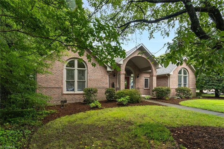 Property Photo:  5100 Birnamwood Trail  NC 27407 