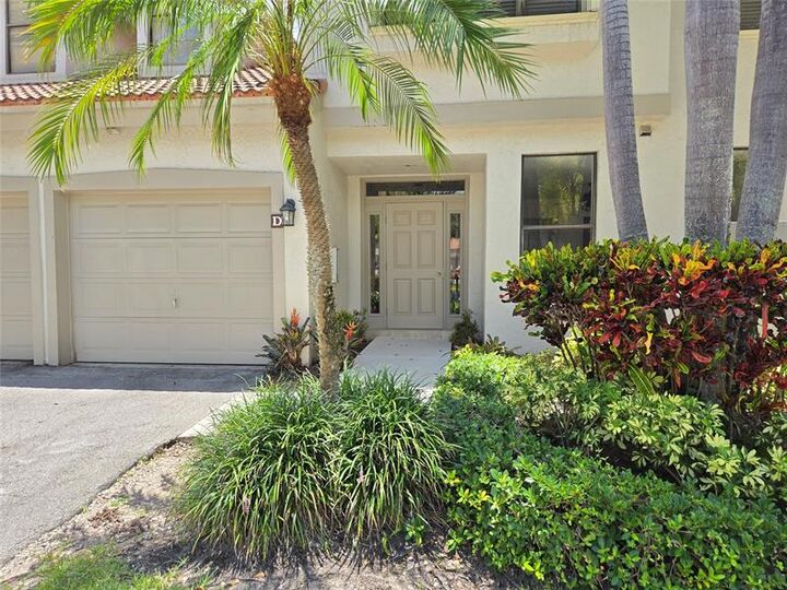 Property Photo:  5800 Coach House Cir D  FL 33486 