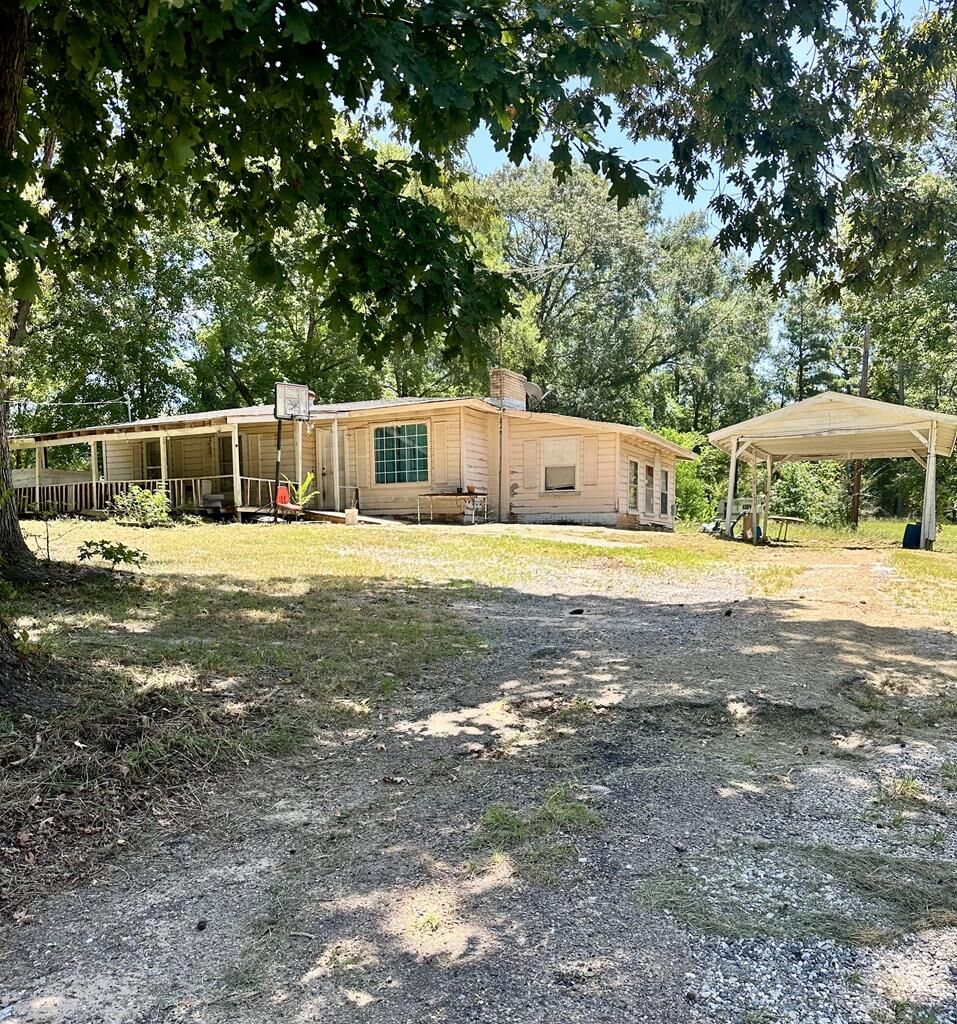 Property Photo:  7195 Texas 7  TX 75964 