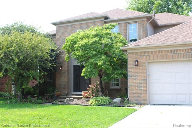 Property Photo:  48711 Cross Creek Drive  MI 48044 