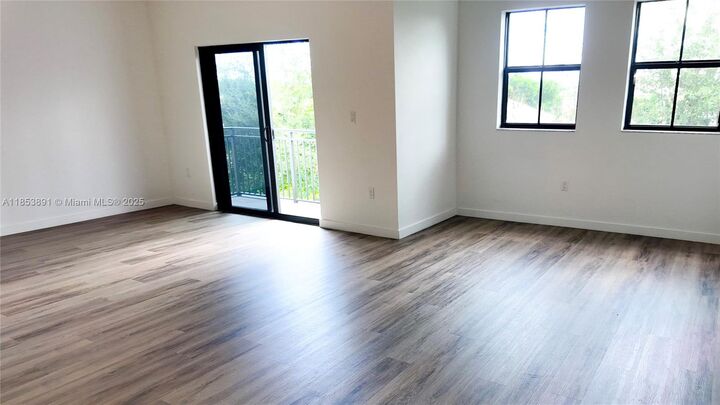 Property Photo:  15560 SW 136 St #3-206  FL 33196 