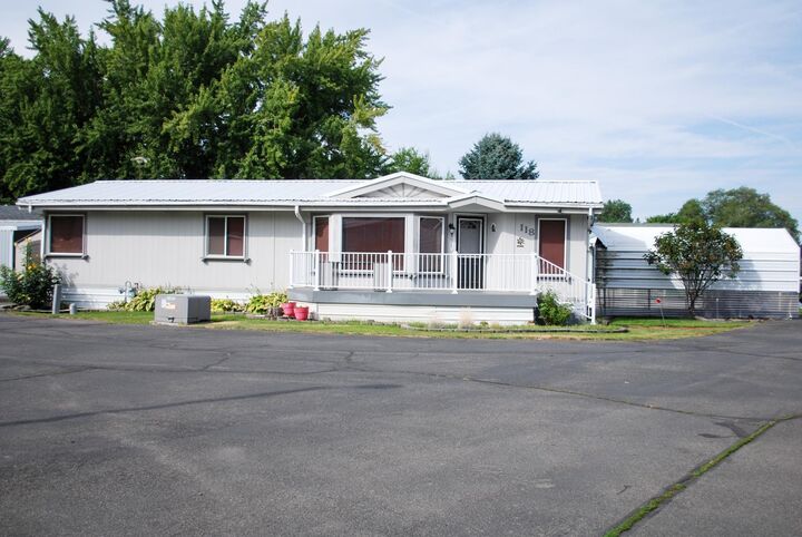 Property Photo:  2601 N Barker Rd 118  WA 99027 