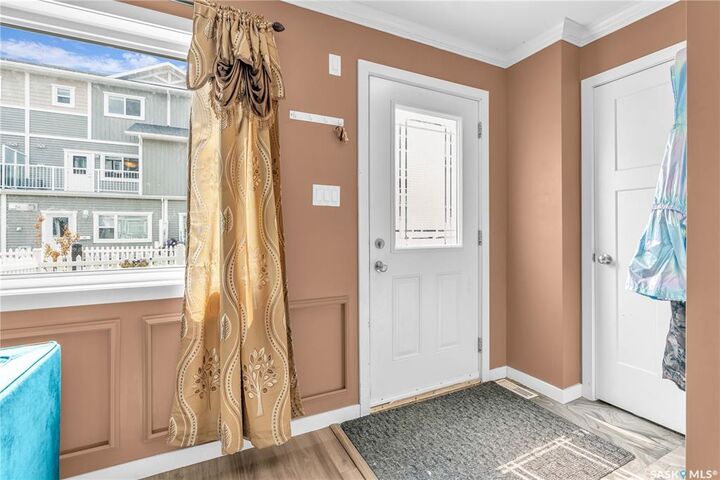 Property Photo:  130 Marlatte Crescent 1215  SK S7W 0W1 