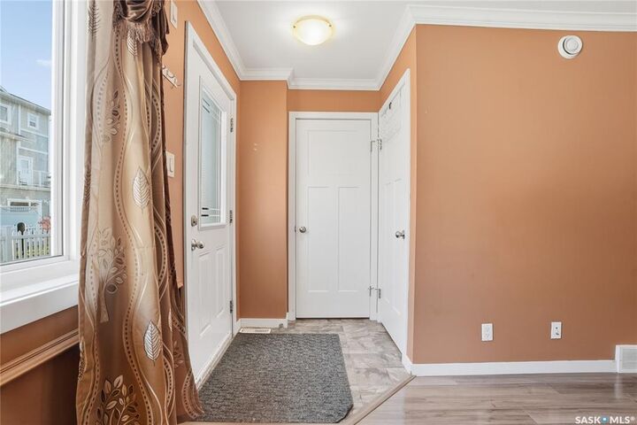 Property Photo: 130 Marlatte Crescent 1215 SK S7W 0W1