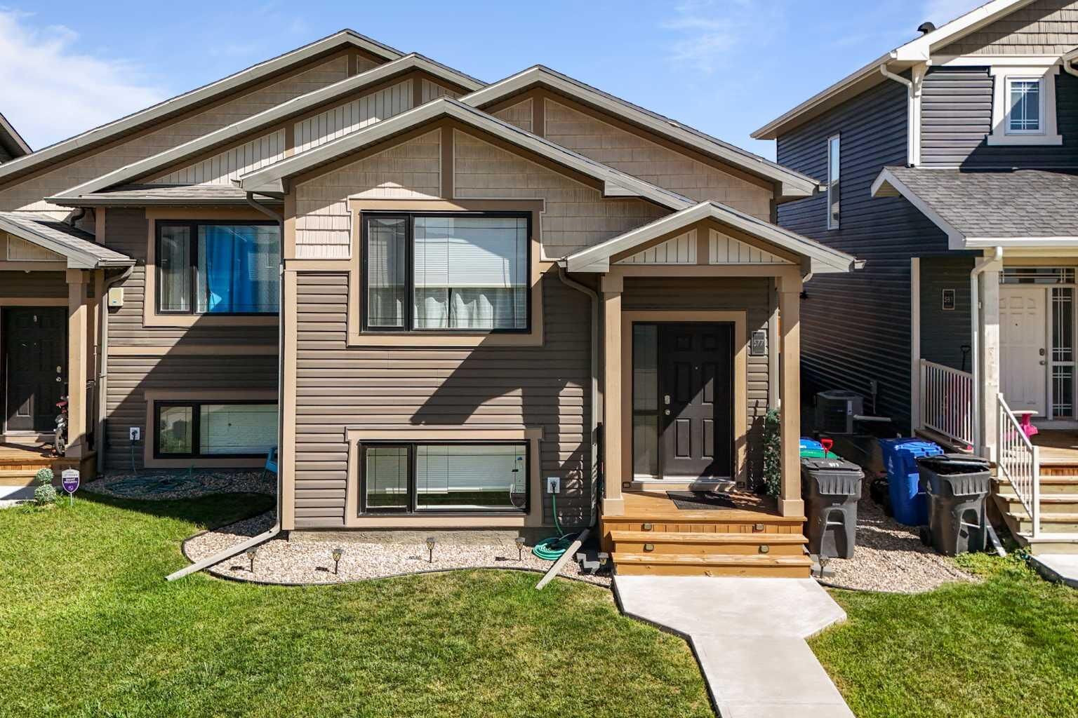 Property Photo:  577 Blackwolf Boulevard N  AB T1H 7C8 