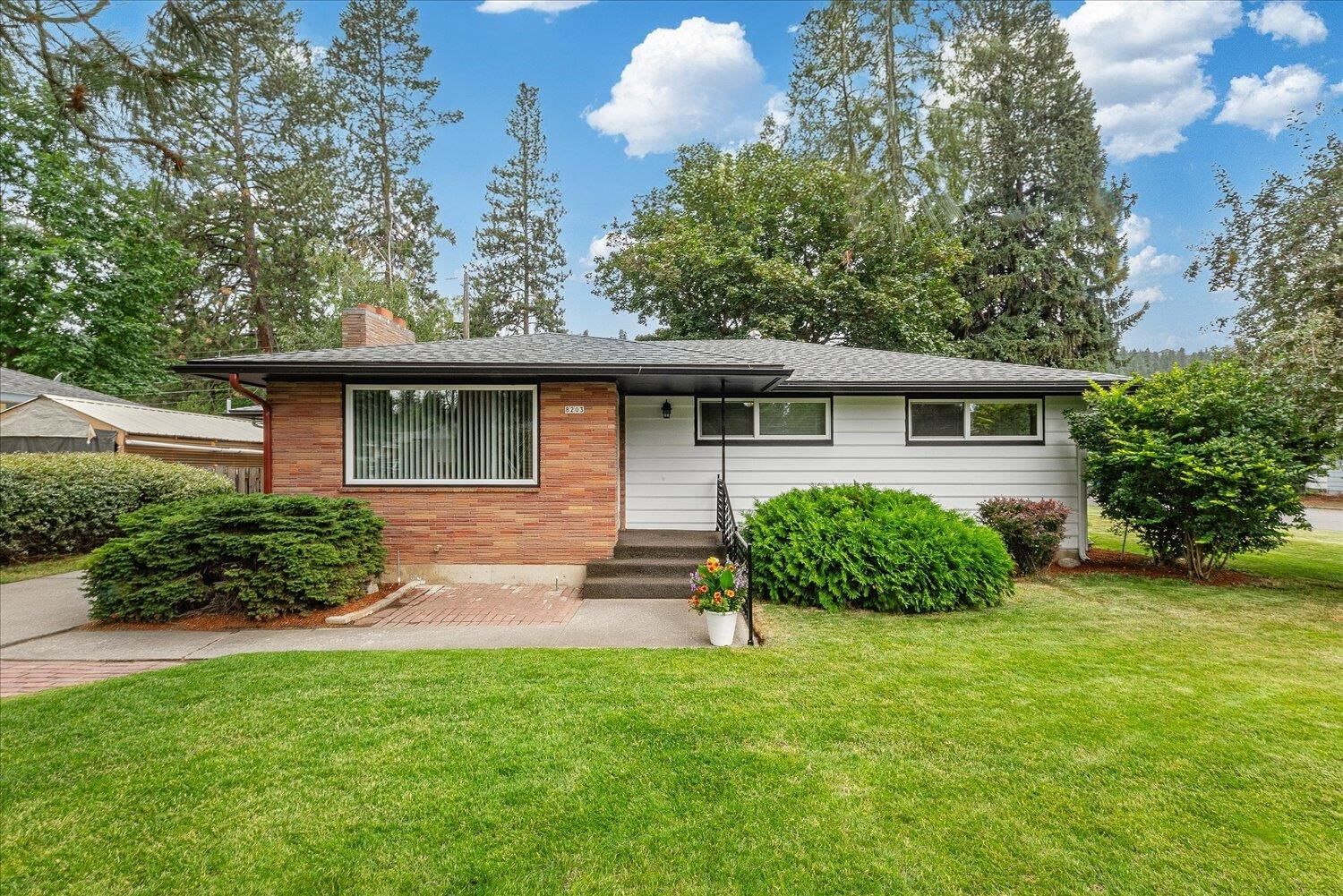 Property Photo: 8203 N Hughes Dr WA 99208
