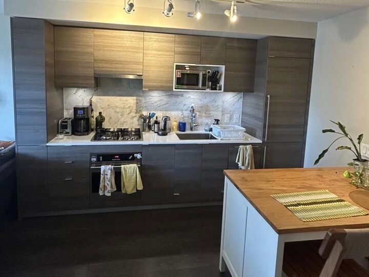 Property Photo:  602 Como Lake Avenue 22xx  BC V3G 0G2 