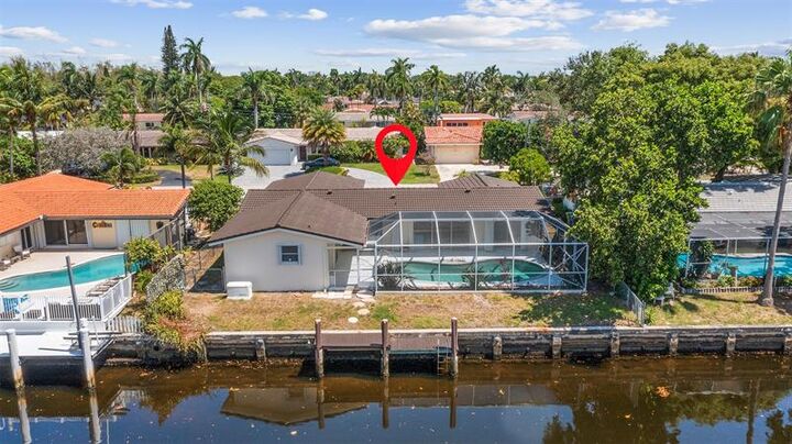 Property Photo: 1430 NE 57th Ct FL 33334