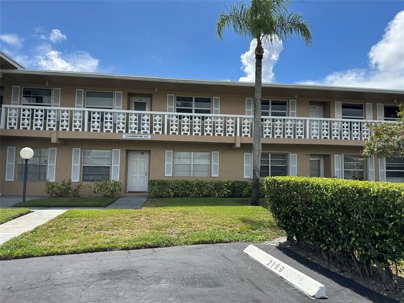Property Photo:  1130 Mahogany Way 203  FL 33445 