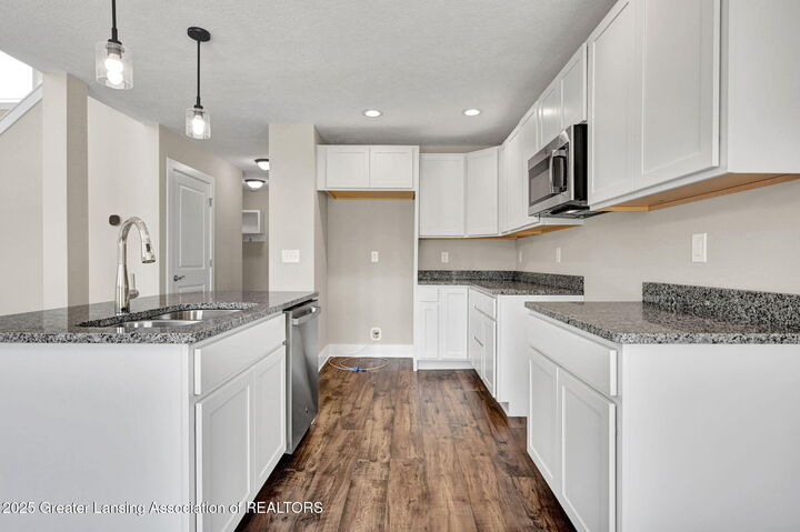 Property Photo: 1565 Thimbleberry Drive MI 48842