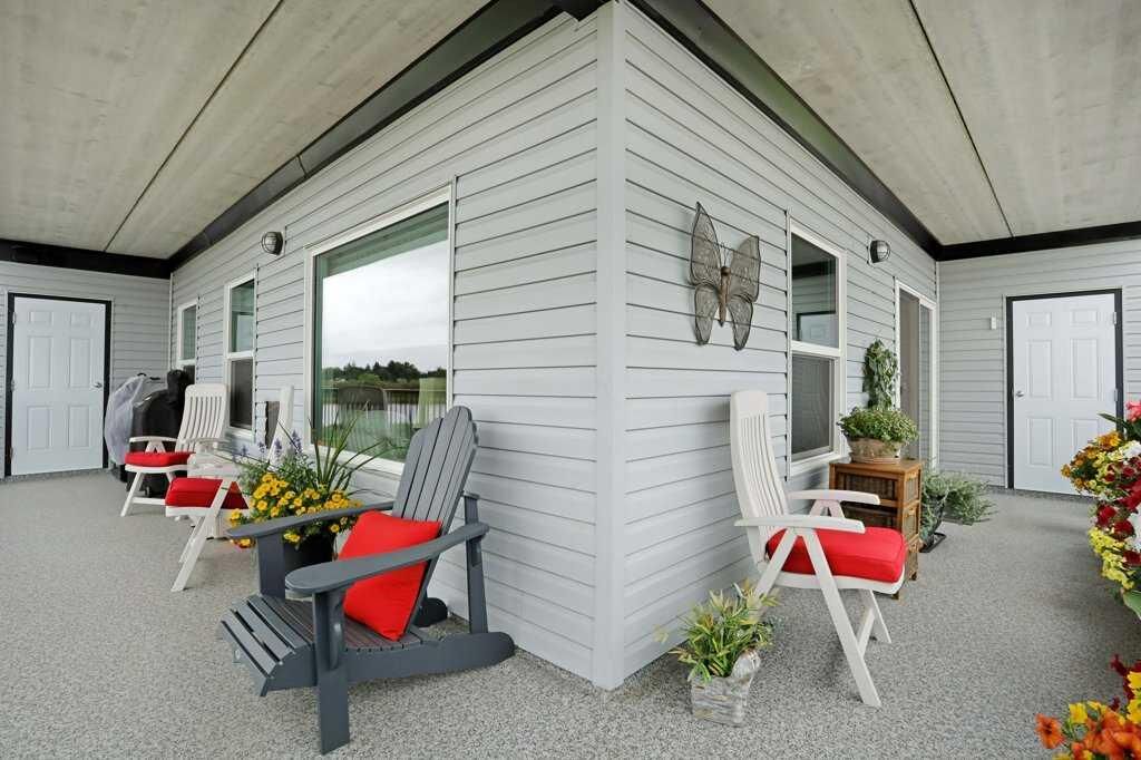 Property Photo:  499 Meadowlake Court E 208  AB T1R 0Y7 