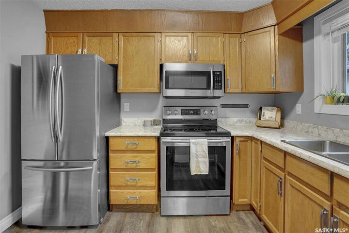Property Photo:  1217 Runciman Crescent N  SK S4X 2Z3 
