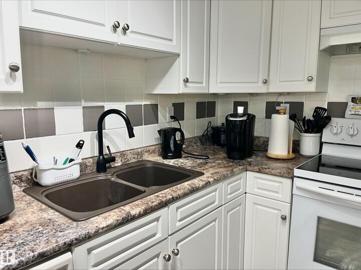 Property Photo:  6 Spruce Ridge Drive 204B  AB T7X 4P4 