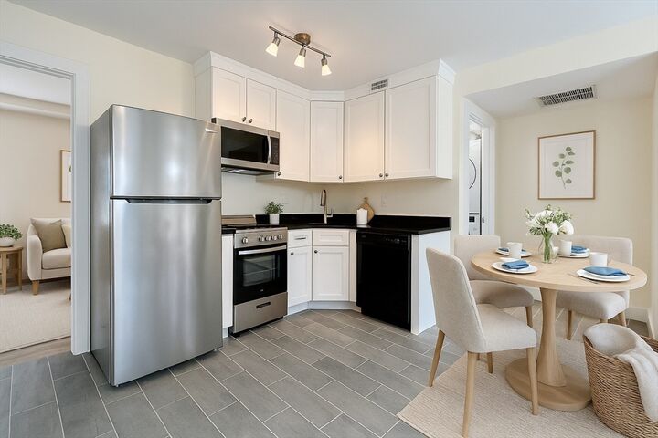 Property Photo:  13 Dalby St C  MA 02458 