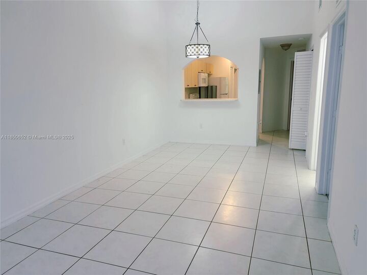 Property Photo:  1240 SE 31st Ct 202-32  FL 33035 