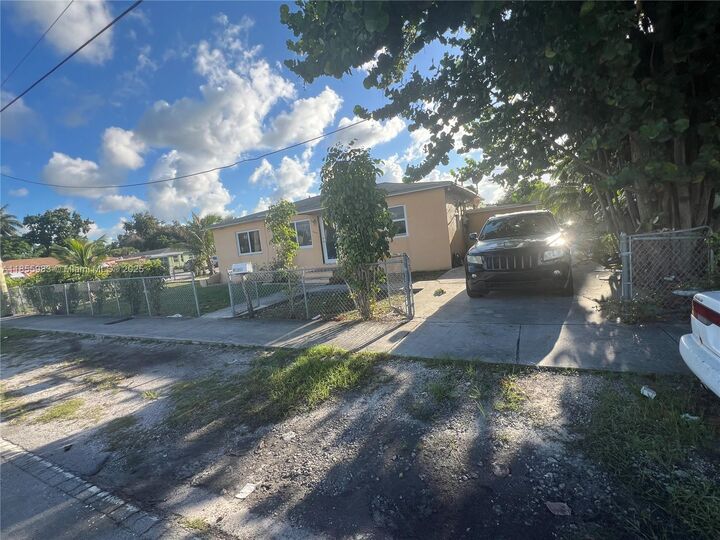 Property Photo:  801 NW 105th St  FL 33150 