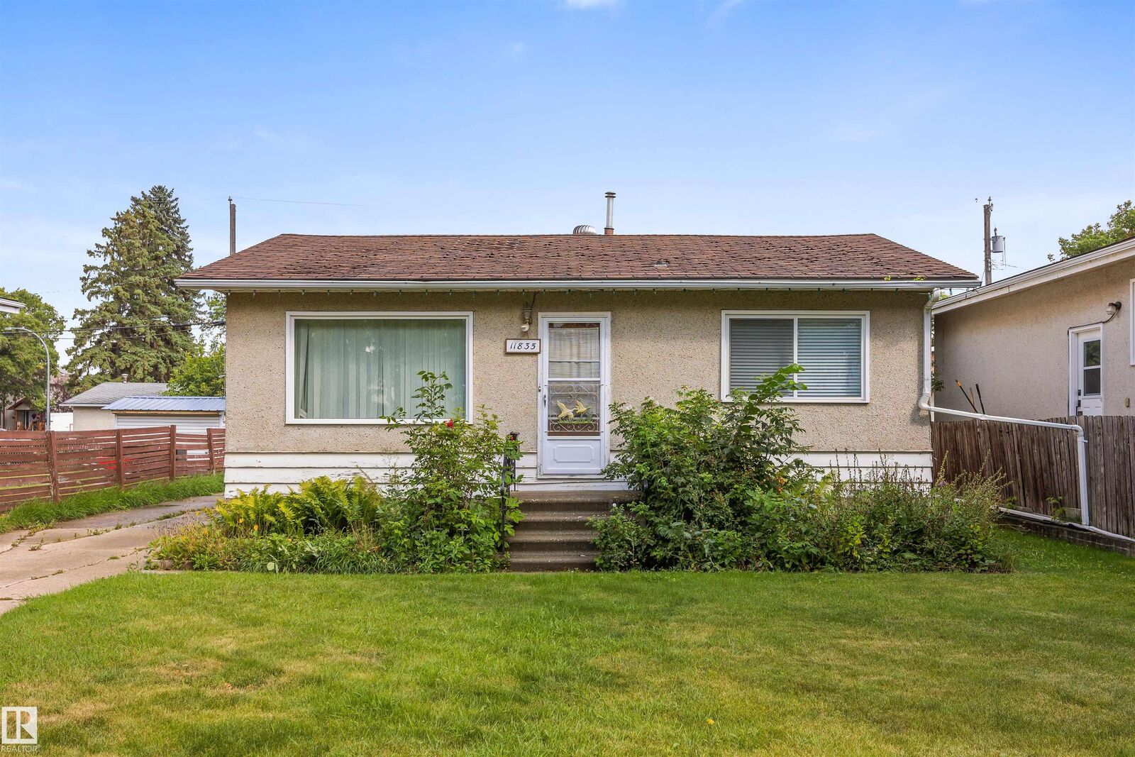 Property Photo: 11835 45 Street NW AB T5W 2T3