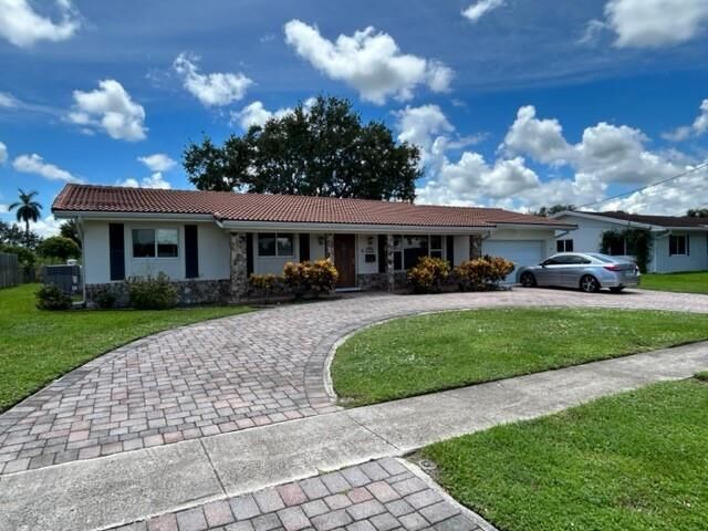 Property Photo:  7200 NW 10th Ct  FL 33313 