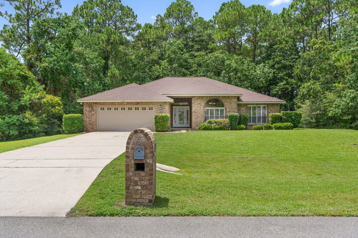 Property Photo:  2431 Knotty Pine Drive  FL 32566 