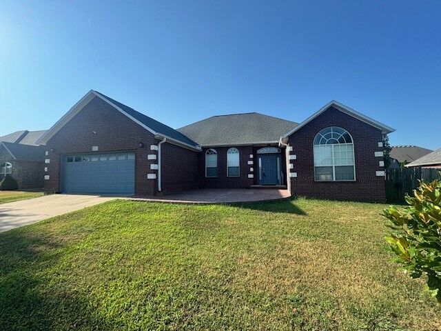 Property Photo: 2303 SW Chinquapin Avenue AR 72713