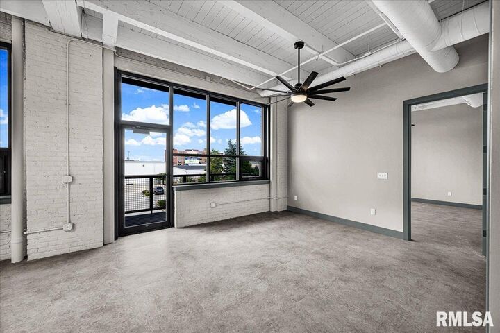 Property Photo:  1001 SW Adams Street 202  IL 61602 