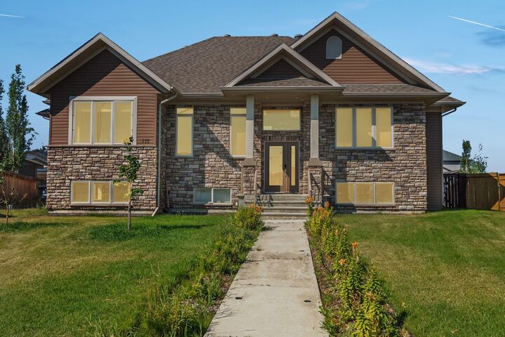 Property Photo:  112 Woodpecker Green  AB T9K 0L3 