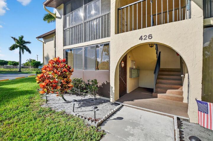Property Photo:  426 Pine Glen Lane A-1  FL 33463 
