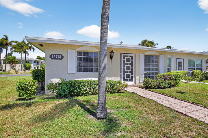 Property Photo:  13761 Flora Place A  FL 33484 
