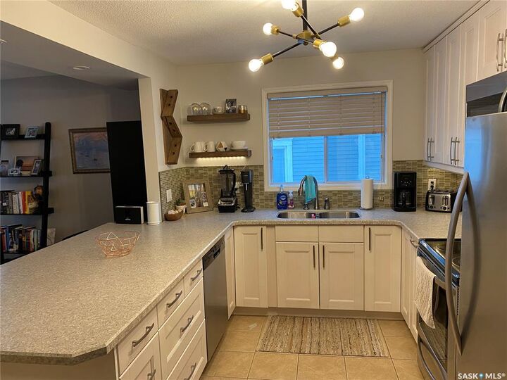 Property Photo: 428 4th Avenue N 102 SK S7K 2M3