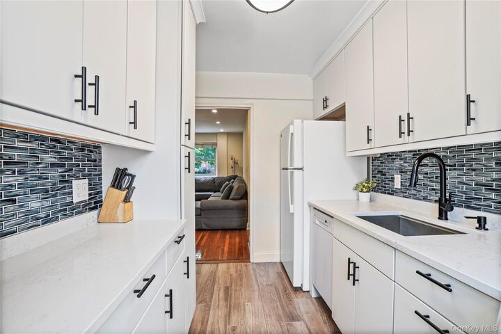 Property Photo: 155-04 84th Street Unit 1 NY 11414
