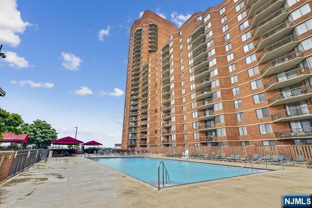 Property Photo:  704 Harmon Cove Tower  NJ 07094