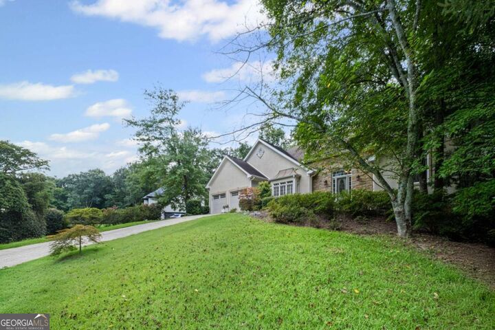 Property Photo:  1820 Azalea Springs Trail  GA 30075