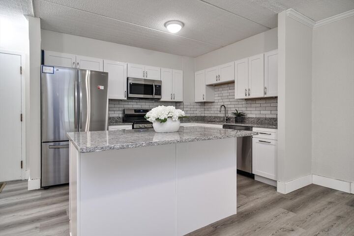 Property Photo: 1500 Worcester Road 215 MA 01702