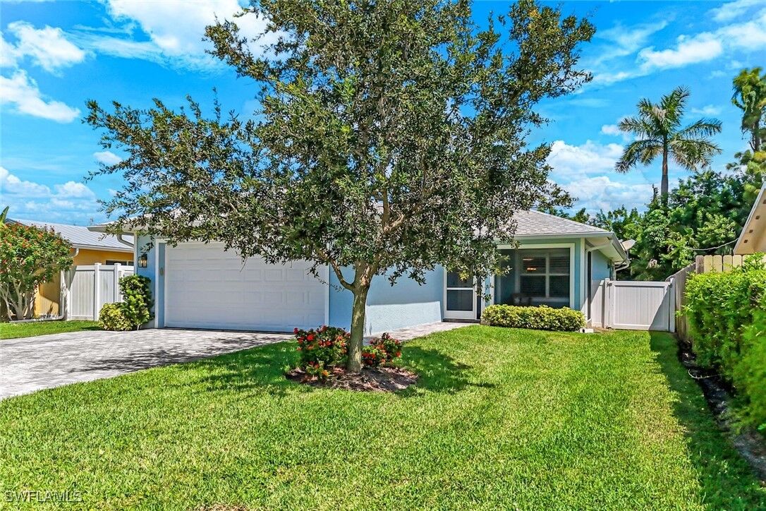 Property Photo: 743 108th Avenue N FL 34108