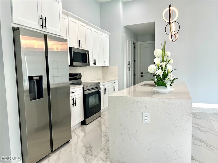Property Photo: 3821 SW 20th Place FL 33914