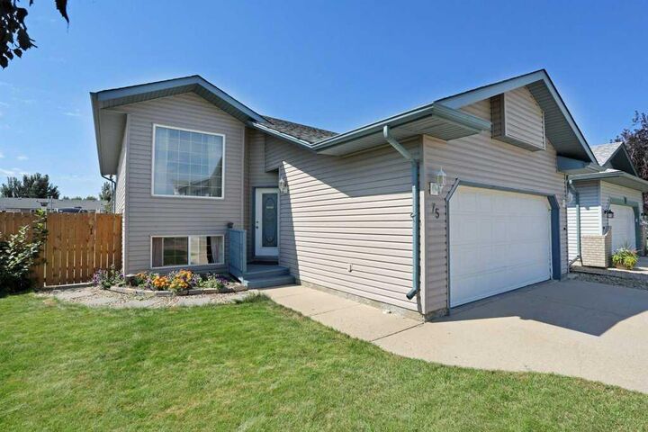 Property Photo: 75 Upland Road W AB T1R 1G7
