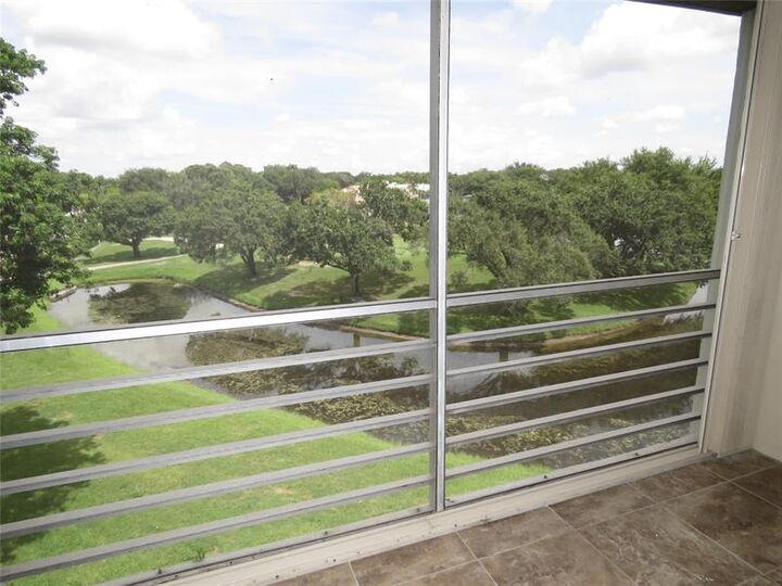 Property Photo: 9470 Poinciana Pl 407 FL 33324