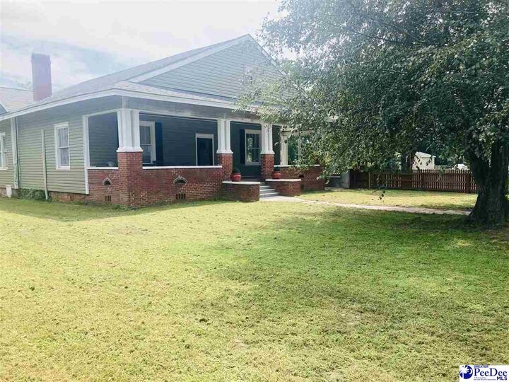 Property Photo:  120 W Market  SC 29161 