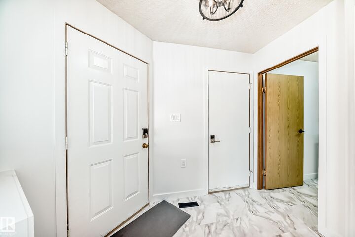 Property Photo: 15571 59A Street NW AB T5Y 2N9