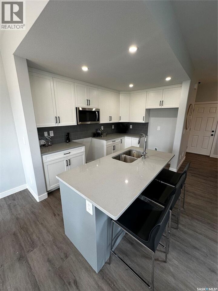 Property Photo:  504 Myles Heidt Manor  SK S7W 1H9 