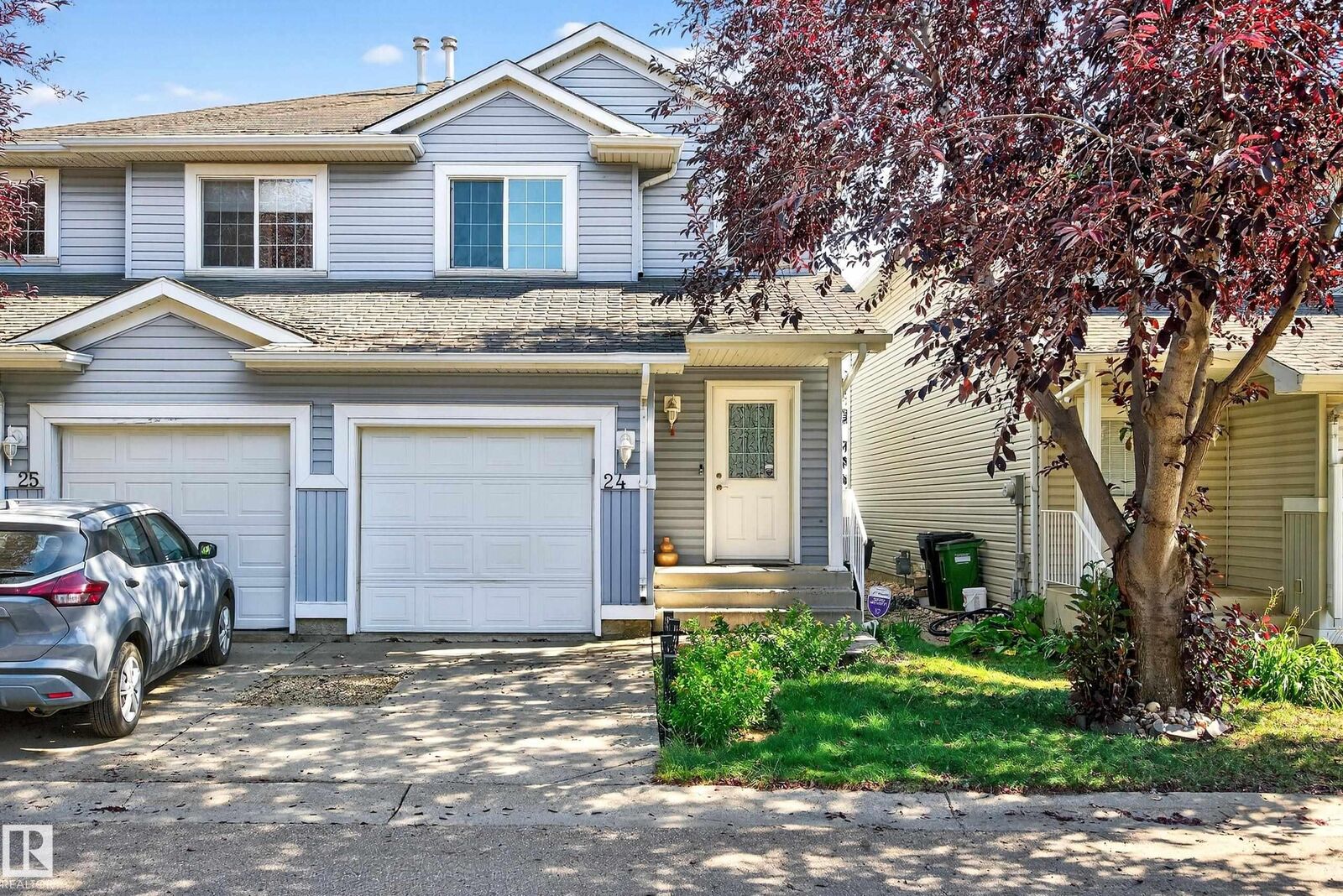 Property Photo: 14603 Miller Boulevard NW 24 AB T5Y 3B6