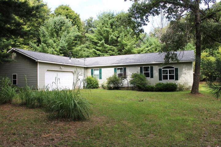Property Photo:  5892 S Carrigan Drive  MI 49337 