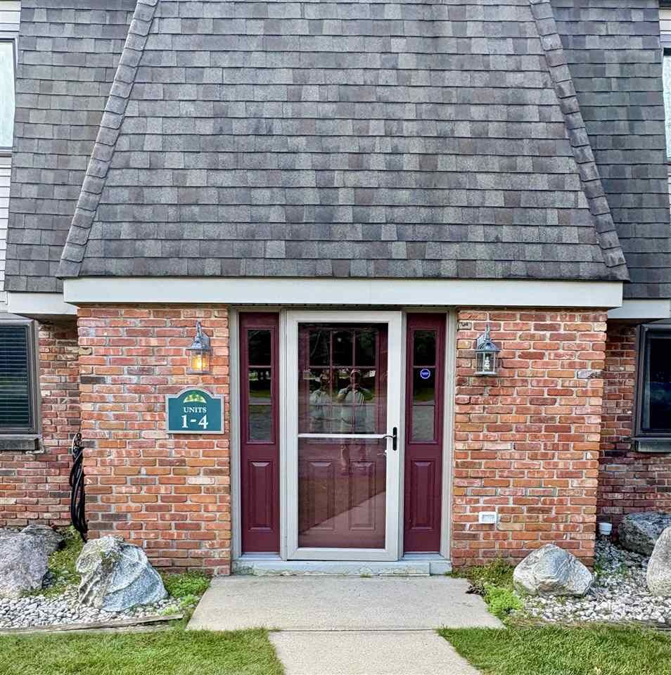 Property Photo:  915 Robinson 1  MI 49712 