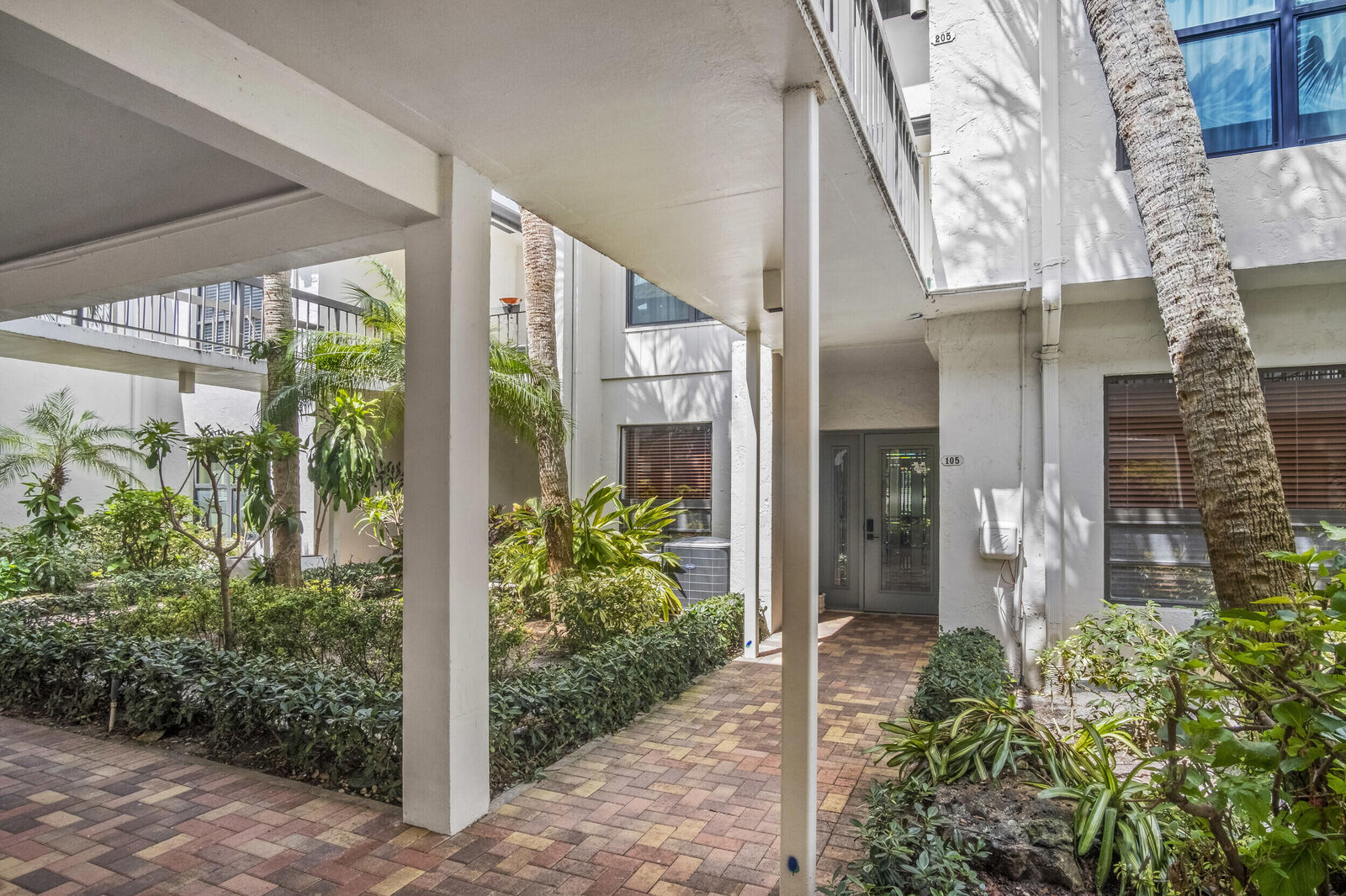 Property Photo: 730 Greensward Court 105-J FL 33445