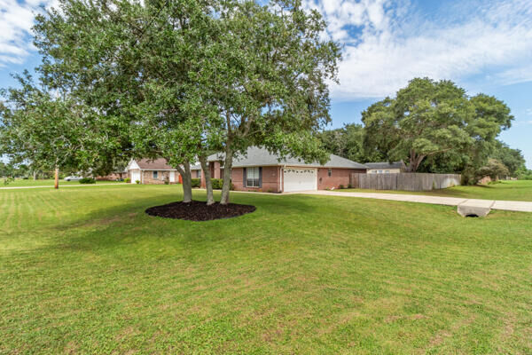 Property Photo:  7272 Manatee St.  FL 32566 
