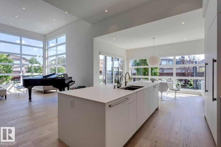 Property Photo: 682 Howatt Drive SW AB T6W 3K3