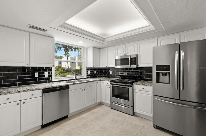 Property Photo:  5084 Marsh Field Road 77  FL 34235 