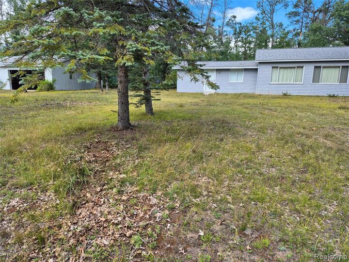 Property Photo: 11864 Spikehorn Road MI 49751 9660