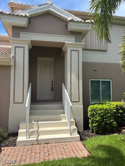 Property Photo: 13960 Lake Mahogany Boulevard 1922 FL 33907