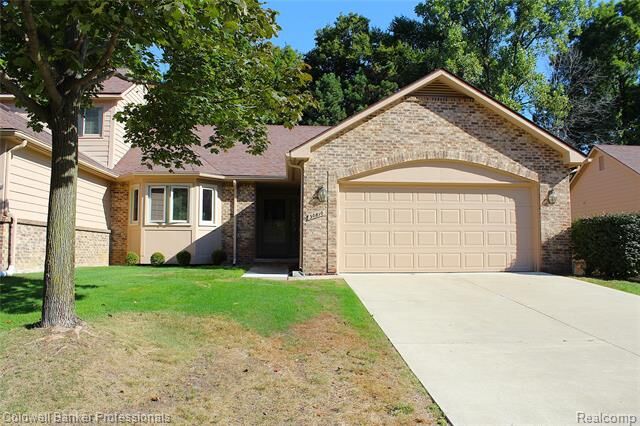 Property Photo: 30810 Misty Pines Drive 13 MI 48336
